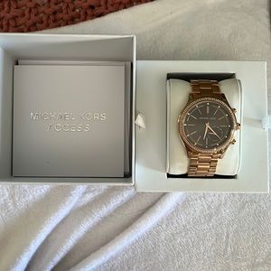 Michael Kors rose gold access watch